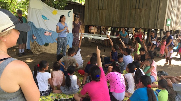 Saxe Gotha missionaries in Belize holding a class for children